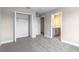 Bedroom featuring doorways to bathroom and closet at 1262 Champions Dr, Daytona Beach, FL 32124