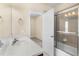 Bright bathroom with a shower/tub combination and a white marble vanity with chrome faucet at 12963 Garridan Ave, Windermere, FL 34786