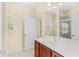 Bathroom with vanity sink, medicine cabinet, and walk-in shower at 12963 Garridan Ave, Windermere, FL 34786