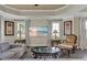 Comfortable living room features accent chair, contemporary media display and stylish decor at 1354 Centre Court Ridge Dr # 104, Reunion, FL 34747