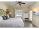 Bright bedroom with sleek wood floors, and a large window at 1354 Centre Court Ridge Dr # 104, Reunion, FL 34747