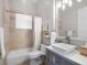 Well-lit bathroom with a stylish vanity, vessel sink, and bathtub-shower combination at 1417 Terralago Pl, Oviedo, FL 32765