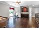 Large bonus room with hardwood floors and a wet bar, perfect for entertaining at 1417 Terralago Pl, Oviedo, FL 32765