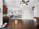 Spacious loft area with wood floors, offering a versatile living space upstairs at 1417 Terralago Pl, Oviedo, FL 32765