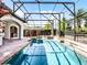 Stunning pool with a spa inside a screened enclosure offering a refreshing oasis at 1417 Terralago Pl, Oviedo, FL 32765