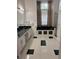 Elegant bathroom with dual sinks, a soaking tub, and a separate shower, perfect for relaxation at 1445 Valley Pine Cir, Apopka, FL 32712