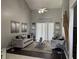 Inviting living room featuring modern decor, high ceilings, lots of natural light, and a ceiling fan at 1445 Valley Pine Cir, Apopka, FL 32712