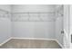 Spacious walk-in closet offering ample storage space and neat organization at 1580 Delphi Way, New Smyrna Beach, FL 32168