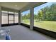 Comfortable screened-in patio providing a serene outdoor living space at 1580 Delphi Way, New Smyrna Beach, FL 32168