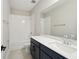 Stylish bathroom with a vanity, toilet and shower at 16454 Silver Brook Way, Winter Garden, FL 34787
