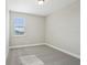Cozy bedroom with plush carpeting and natural light from window at 16454 Silver Brook Way, Winter Garden, FL 34787