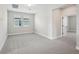 Neutral bedroom with plush carpeting and natural light at 16454 Silver Brook Way, Winter Garden, FL 34787
