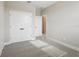 Bright bedroom with plush carpeting and convenient closet at 16454 Silver Brook Way, Winter Garden, FL 34787