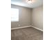 Neutral bedroom with carpet and window at 16454 Silver Brook Way, Winter Garden, FL 34787