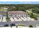 Aerial shot of townhomes showcasing the community layout and landscaping at 1900 Erudite Way, Winter Park, FL 32792