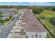 A bird's eye view of townhomes showcasing neat roofs and well-kept grounds at 1900 Erudite Way, Winter Park, FL 32792