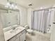 Bathroom featuring tile flooring, shower and sink with vanity at 1900 Erudite Way, Winter Park, FL 32792