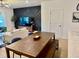 Open concept dining area with modern design, wood floors and an inviting atmosphere at 1900 Erudite Way, Winter Park, FL 32792