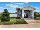 The entrance building showcases the architectural style and community feel at 1900 Erudite Way, Winter Park, FL 32792