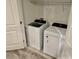 Laundry room with tile flooring and a washer and dryer at 1900 Erudite Way, Winter Park, FL 32792
