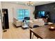 Modern living room featuring contemporary decor, statement lighting, and a view of the outdoors at 1900 Erudite Way, Winter Park, FL 32792