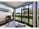 Enjoy the view from this screened lanai with comfortable seating at 1900 Erudite Way, Winter Park, FL 32792