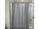 Shower with tile walls and a shower curtain at 1900 Erudite Way, Winter Park, FL 32792
