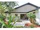 Private backyard patio, beautiful lush plants, pavers, perfect for outdoor relaxing at 2524 Shadybranch Dr, Orlando, FL 32822