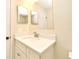 Bathroom with a single sink vanity, an updated faucet, and neutral walls at 2524 Shadybranch Dr, Orlando, FL 32822