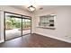 Open dining area featuring wood-look tile floors and a sliding glass door leading to the outdoor patio at 2524 Shadybranch Dr, Orlando, FL 32822