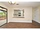Bright dining area with wood-look tile flooring adjacent to the kitchen with a convenient breakfast bar at 2524 Shadybranch Dr, Orlando, FL 32822