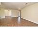 Large living area with tile floors, neutral walls, and doorways to other rooms at 2524 Shadybranch Dr, Orlando, FL 32822