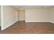Bright living area featuring wood-look tile flooring and ample natural light at 2524 Shadybranch Dr, Orlando, FL 32822