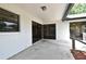 This covered patio has access to sliding glass doors at 2524 Shadybranch Dr, Orlando, FL 32822