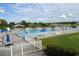 A refreshing community pool and lake enhance community life at 2524 Shadybranch Dr, Orlando, FL 32822