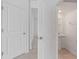 Clean bathroom with a pedestal sink, neutral paint, and tile flooring at 2716 Pierr St, Davenport, FL 33837