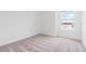 A bedroom with neutral paint, carpet flooring, and a bright window that offers natural light at 2716 Pierr St, Davenport, FL 33837