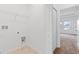 A bright laundry room with washer and dryer hookups at 2716 Pierr St, Davenport, FL 33837