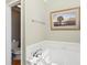 Bathroom with soaking tub and separate toilet at 2746 Windsorgate Ln, Orlando, FL 32828