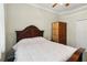 Cozy bedroom with natural light, a fan, and a rustic armoire at 2746 Windsorgate Ln, Orlando, FL 32828
