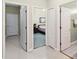 Hallway with white trim and doors leading to the bedrooms and bathroom at 2746 Windsorgate Ln, Orlando, FL 32828