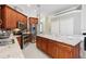 Lovely kitchen featuring stainless steel appliances, granite countertops, and ample cabinet space at 2746 Windsorgate Ln, Orlando, FL 32828