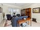 Comfortable living room featuring tile flooring and elegant furniture with classic decor at 2746 Windsorgate Ln, Orlando, FL 32828