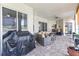 Covered patio featuring brick flooring, seating area, and covered grill at 2746 Windsorgate Ln, Orlando, FL 32828