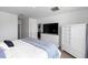 Bright and cozy primary bedroom with a clean aesthetic and a large window with a view at 296 Inman Blvd, Winter Haven, FL 33881