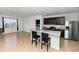 Open concept living space with an eat-in kitchen island and lots of natural light at 296 Inman Blvd, Winter Haven, FL 33881