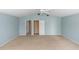 Spacious bedroom boasts a vaulted ceiling and large windows for lots of natural light at 3065 Bridgehampton Ln, Orlando, FL 32812