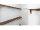 Walk-in closet featuring upper and lower shelves for ample storage space at 3065 Bridgehampton Ln, Orlando, FL 32812