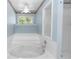 The main bathroom displays a garden tub, a walk in shower, and a ceiling fan above at 3065 Bridgehampton Ln, Orlando, FL 32812