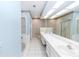 Large main bathroom with shower stall, garden tub, double sinks, and lots of storage at 3065 Bridgehampton Ln, Orlando, FL 32812